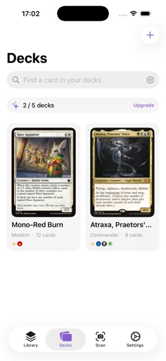 Decks screen showing Atraxa Commander and Mono-Red Burn
